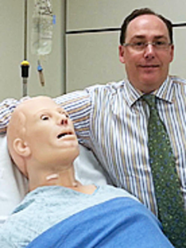 Bill Hammontree, program manager, UC Davis Health System with medical practice dummy (photo courtesy of Bill Hammontree) 
