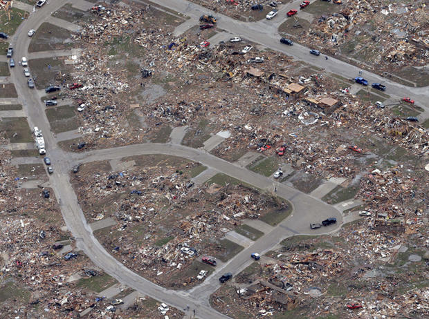 An aerial view shows an entire neighborhood destroyed by Monday's tornado 