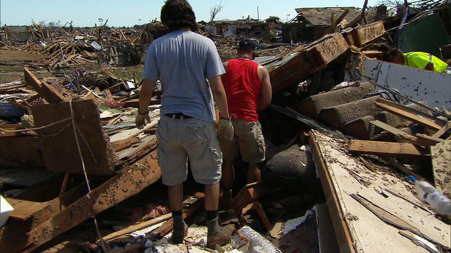 Residents return to tornado-ravaged neighborhoods 