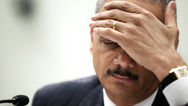 Attorney General Eric Holder, shown testifying before Congress last week, personally approved the controversial search warrant for a Fox News correspondent's email. 