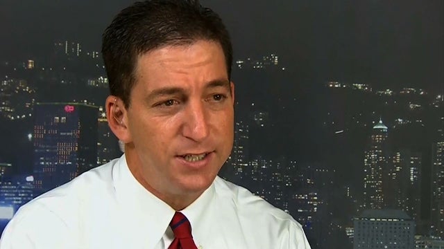 Journalist who broke surveillance story says he's glad public knows 