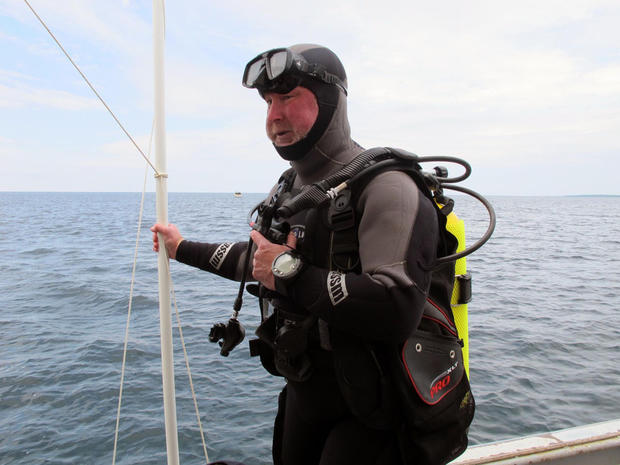 Michel L'Hour, director of France's Department of Underwater Archaeological Research, prepares to dive to what explorers believe may be the site of the Griffin in northern Lake Michigan. 
