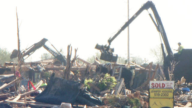 The city of Moore has cleared 59,000 tons of debris, but another 90,000 tons remain. 