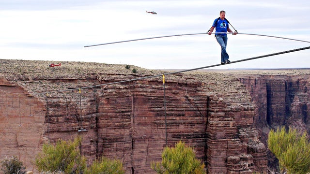 Aerialist Nik Wallenda near the end of his quarter mile walk over the Little Colorado River Gorge in northeastern Arizona on Sunday, June 23, 2013. The daredevil successfully traversed the tightrope strung 1,500 feet above the chasm near the Grand Canyon  