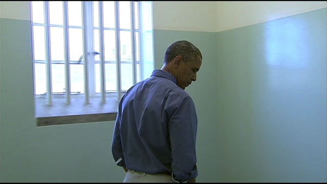 Obama family visits island where Mandela was imprisoned 
