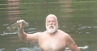 Man catches rainbow trout on demand with bare hands CBS News