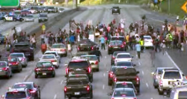 Protesters stop I-10 traffic in Los Angeles, Calif., on July 14, 2013. 