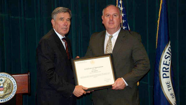 Veteran narcotics detective Glynn, who overseas the program in Quincy, receives a citation this year from Gil Kerlikowske, Director of the National Office of Drug Control Policy. 