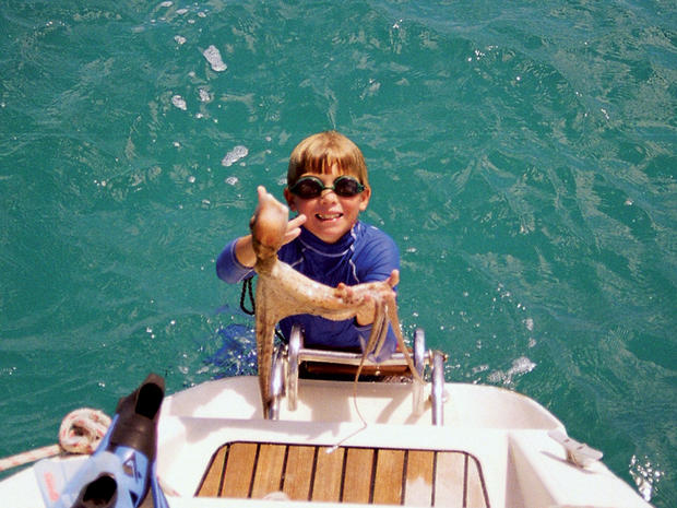 Jack, the "nature boy" of the family, never missed a chance to explore life under the sea. Here he is bringing back a live octopus to show his family. 