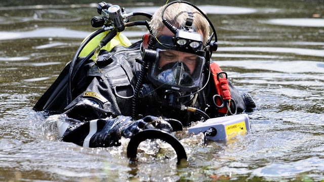 New England Patriots tight end Aaron Hernandez, left, stands with his attorney, Michael Fee, right, during a hearing in Attleboro District Court June 26, 2013, in Attleboro, Mass. 