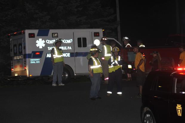 Emergency crews respond to a reported shooting at the Ross Township building, Monday, Aug. 5, 2013 in Saylorsburg, Pa. 