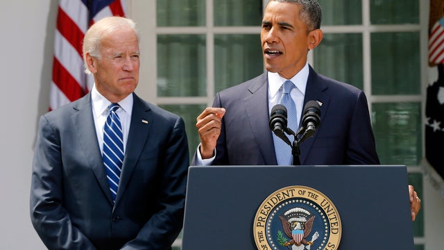 President Obama stands with Vice President Joe Biden as he makes a statement about Syria in the Rose Garden at the White House in Washington Aug. 31, 2013. 