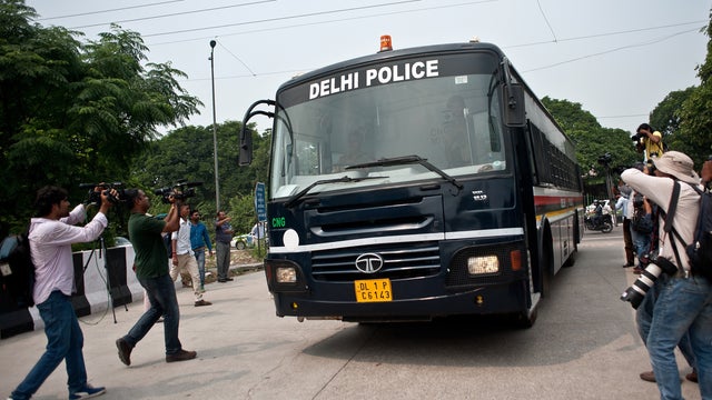 An Indian police van carrying the accused in a gang rape case arrives at the Saket Court Complex in New Delhi 