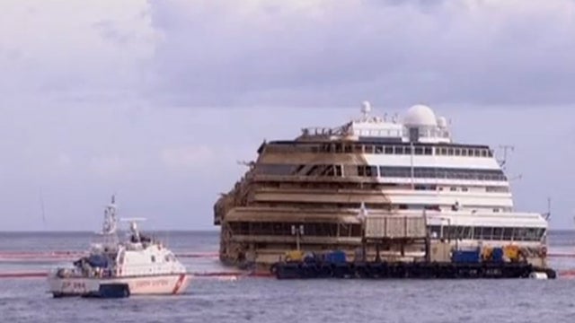 Uprighted Costa Concordia is seen in waters just off Italy on Sept. 17, 2013 