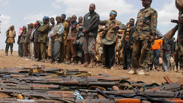 Members of the al Qaeda-linked al-Shabab group give themselves up to African Union forces in Garsale 