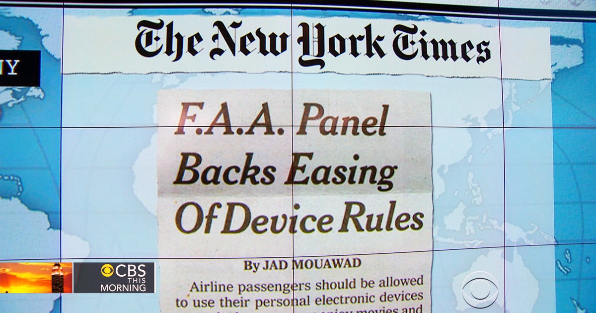 Headlines: FAA panel says gadgets OK for take-off and landing - CBS News