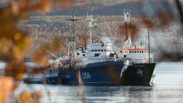 The Greenpeace ship anchored with a Russian Coast Guard ship 