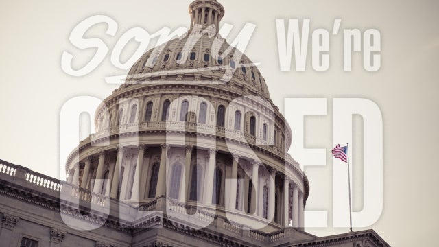 Government shutdown closed sign over US Capitol Building 