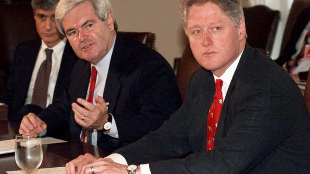 Speaker of the House Newt Gingrich and President Clinton begin a bipartisan meeting on stalled budget talks at the White House in Washington Dec. 22, 1995. 