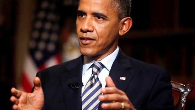 President Obama speaks during an interview with The Associated Press in the White House library in Washington Oct. 4, 2013. 