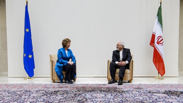 EU High Representative for Foreign Affairs Catherine Ashton speaks with Iranian Foreign Minister Mohammad Javad Zarif  