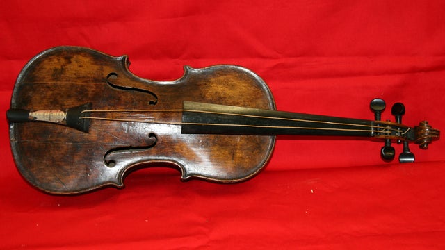 A violin believed to be the one played by Titanic bandmaster Wallace Hartley is seen in an undated handout image from auction house Henry Aldridge and Son made available Oct. 18, 2013. 