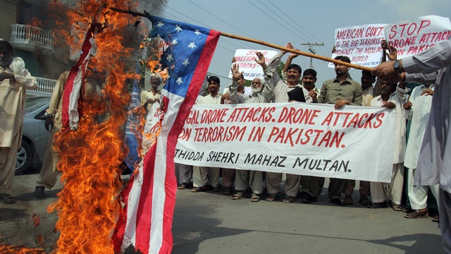 Pakistanis protest against U.S. drone strikes in the Pakistani tribal areas during a march in Multan 