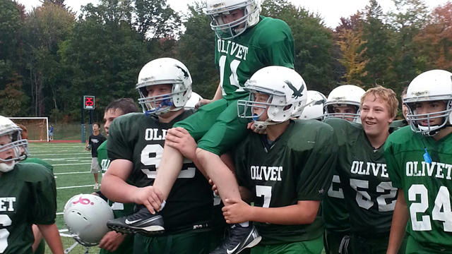 The football players at Olivet Middle School have embraced Keith Orr. 