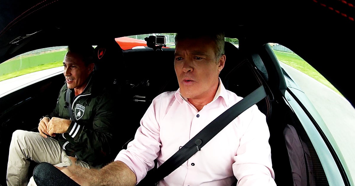 Racing a Lamborghini at 155 mph - CBS News