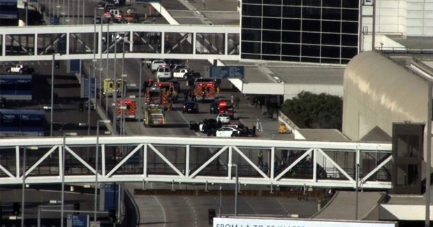 LAX Shooting TSA officer dead, others wounded, gunman in custody, law
