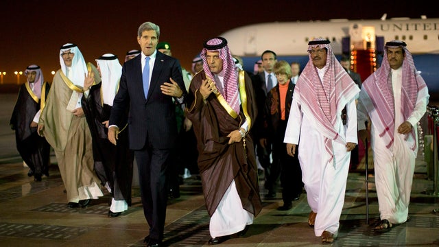 John Kerry is welcomed by Saudi Foreign Minister 