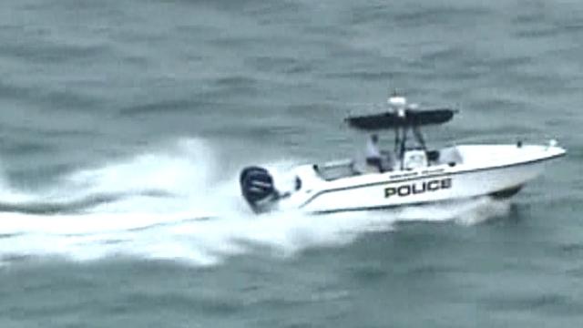 police-boat-searching-for-man-who-fell-from-plane.jpg 