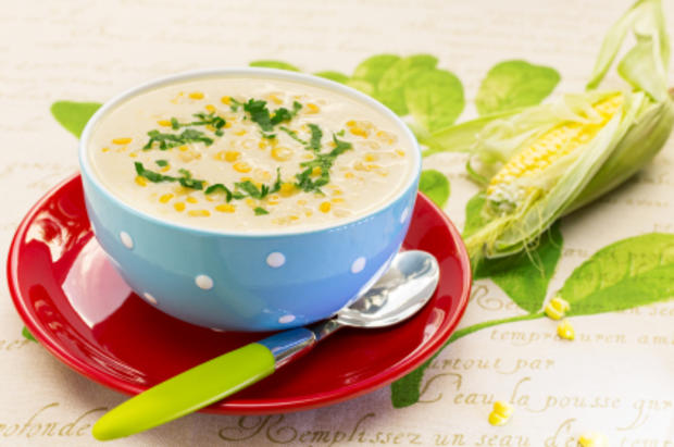 Cream of corn soup in blue bowl 