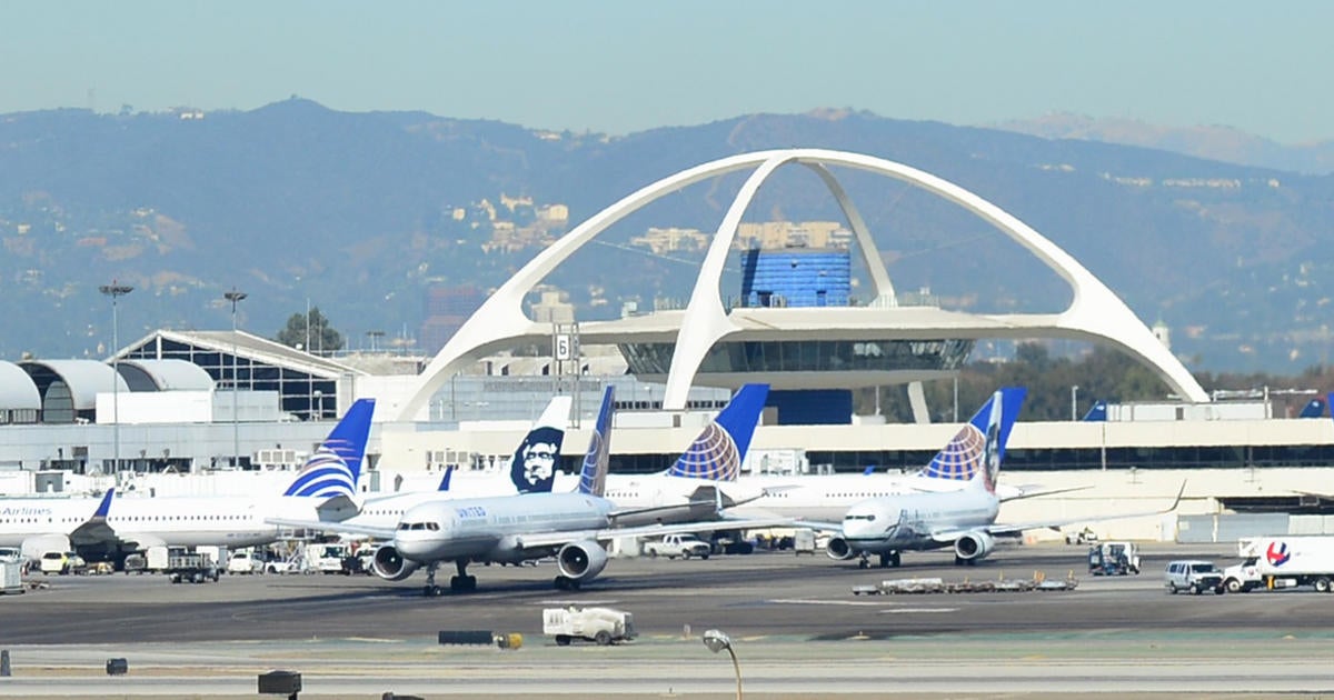 Travelers evacuate LAX after erroneous gun reports - CBS News