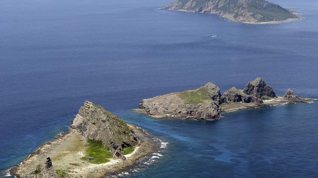 A group of disputed islands, Uotsuri island (top), Minamikojima (bottom) and Kitakojima, known as Senkaku in Japan and Diaoyu in China is seen in the East China Sea 