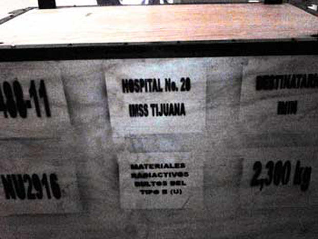 A box containing a decommissioned and safely encased cobalt-60 medical teletherapy unit is seen prior to it being loaded onto a truck for transport to a radioactive waste facility in Mexico. 