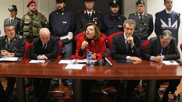 Italian Prosecutor Maria Teresa Principato (C) gives a press conference in Palermo, Dec. 13, 2013, following the arrest of 30 people linked to Matteo Messina Denaro 