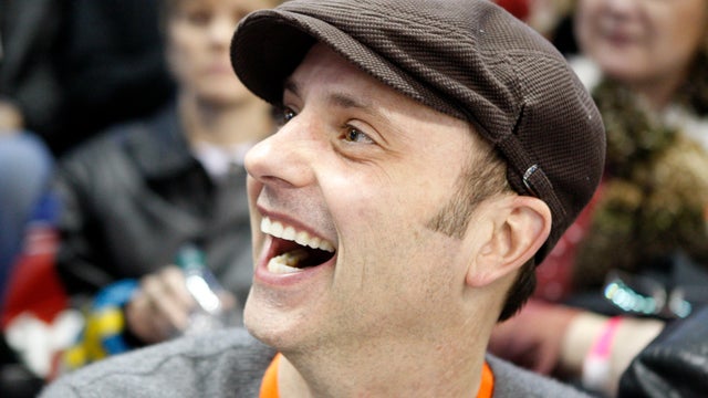 Jan. 2010 file photo shows former Olympian Brian Boitano smiles in the stands during the men's singles competition at the U.S. figure skating championships in Spokane, Wash. 