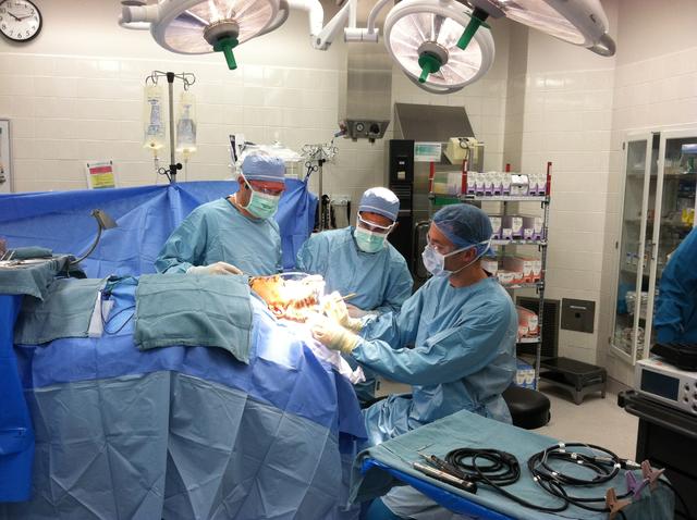 21 Hopper makes first incision.JPG 