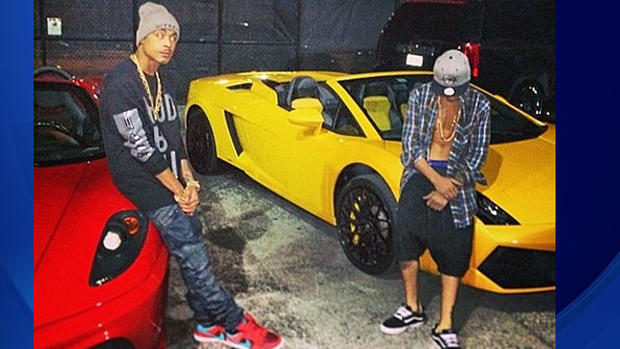 khalil-amir-sharieff-aka-crazy-khalil-and-justin-bieber-in-front-of-the-red-ferrari-and-yellow-lamborgini-prior-to-their-arrests-in-miami-beach.jpg 