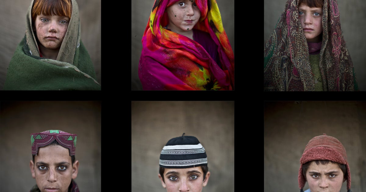 Faces of young Afghan refugees