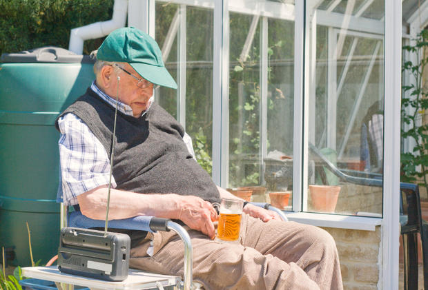 Man Listening To Radio Outside Summer Beer 