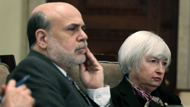 Then-Federal Reserve Board Chairman Ben Bernanke and Janet Yellen, then-Fed vice chair, listen during a meeting of the Board of Governors of the Federal Reserve System to discuss the final version of the so-called Volcker Rule Dec. 10, 2013, in Washington 