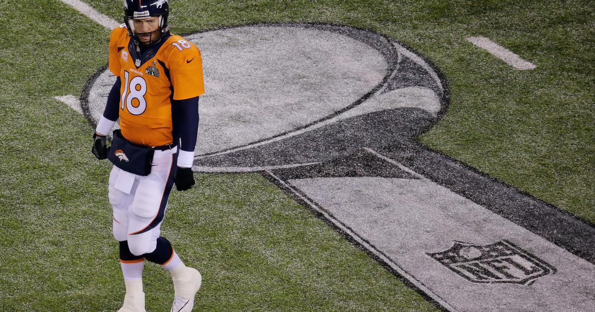 Denver Broncos' Demaryius Thomas catches a pass while covered by Seattle  Seahawks' Byron Maxwell during the first half of the NFL Super Bowl XLVIII  football game Sunday, Feb. 2, 2014, in East