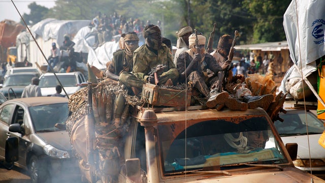 At PK12 Chadian troops escort thousands of Muslim residents from Bangui and Mbaiki, fleeing the Central African Republic capital Bangui in a mass exodus using cars, pickups, trucks, lorries and motorcycles 