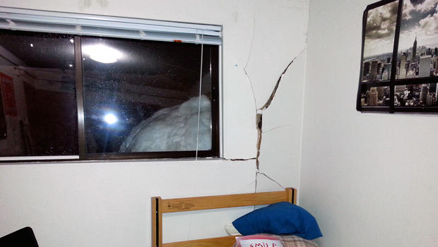 Damage caused by a large snowball that crashed into a Grove Quad dormitory at Reed College in Portland, Ore., is seen Feb. 8, 2014, in this image provided by Reed College. 