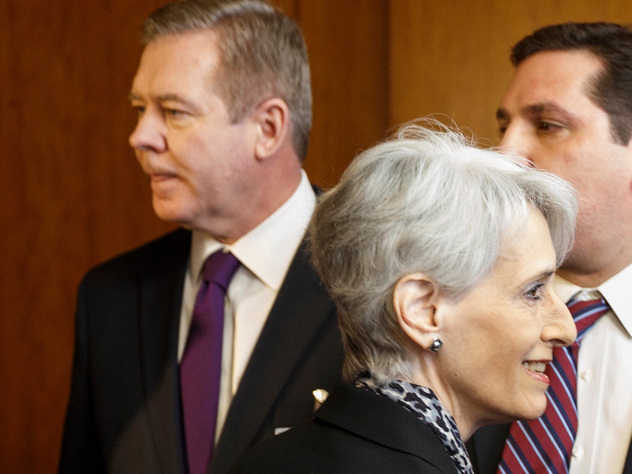United States Under Secretary of State for Political Affairs Wendy Sherman, right, passes in front of Russian Deputy Minister of Foreign Affairs Gennady Gatilov, left 