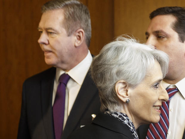 United States Under Secretary of State for Political Affairs Wendy Sherman, right, passes in front of Russian Deputy Minister of Foreign Affairs Gennady Gatilov, left 