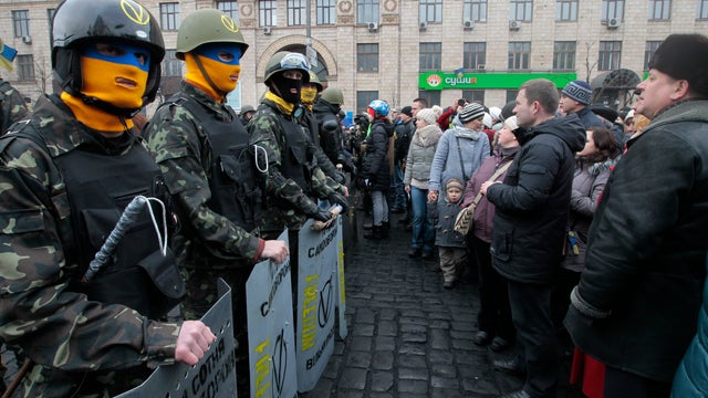 Anti-government activists guard the barricade in central Kiev, Ukraine 