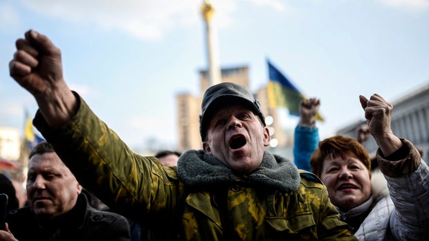 Anti-government protesters chant slogans in Independence Square Feb. 21, 2014, in Kiev, Ukraine. 